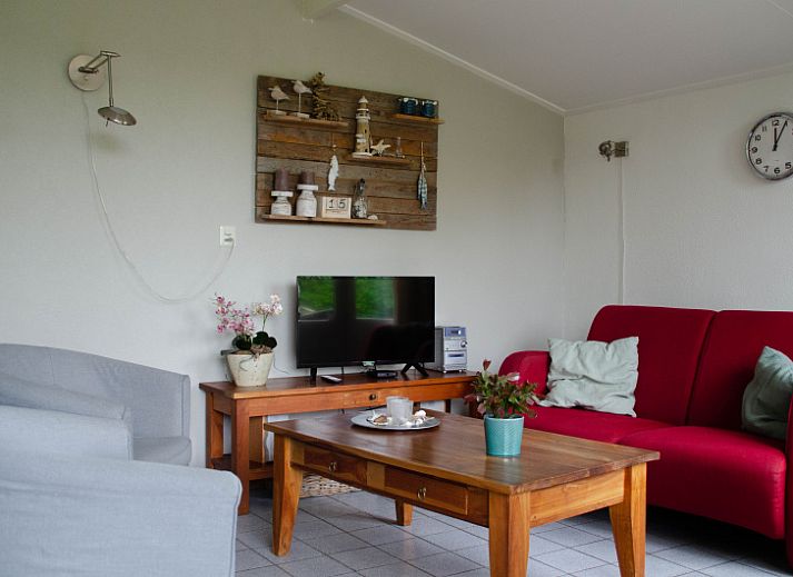 9600 - Daalder - Troost vakantiehuis in De Cocksdorp Texel met groene tuin en schaduwrijke veranda.