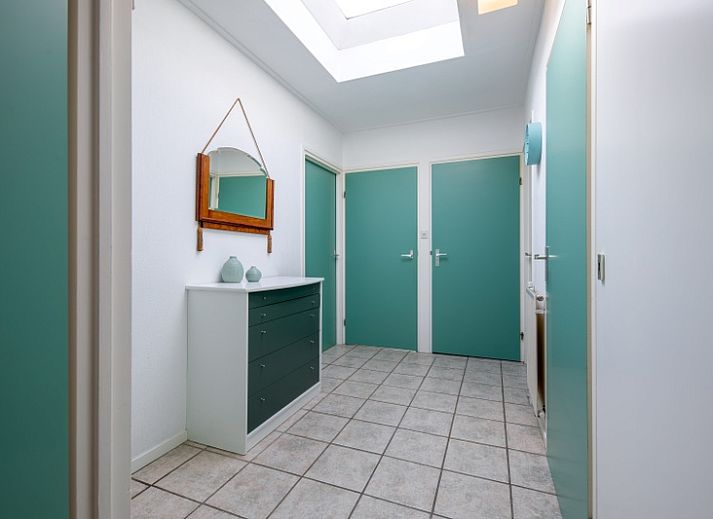 Gezellige woonkamer in Vakantiehuis Slufterduin 52a, De Cocksdorp, Texel met comfortabele zithoek.