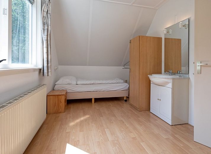 Heller Sitzbereich im Ferienhaus Slufterduin 098, De Cocksdorp, Texel mit Gartenblick.