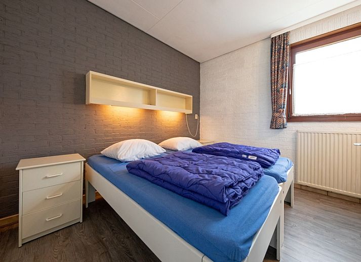 Gezellige woonkamer van Vakantiehuis Slufterhoek 056 in De Cocksdorp Texel met comfortabele zitruimte.