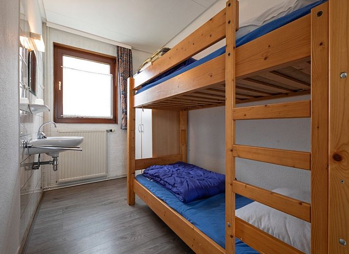 Gezellige woonkamer van Vakantiehuis Slufterhoek 056 in De Cocksdorp Texel met comfortabele zitruimte.