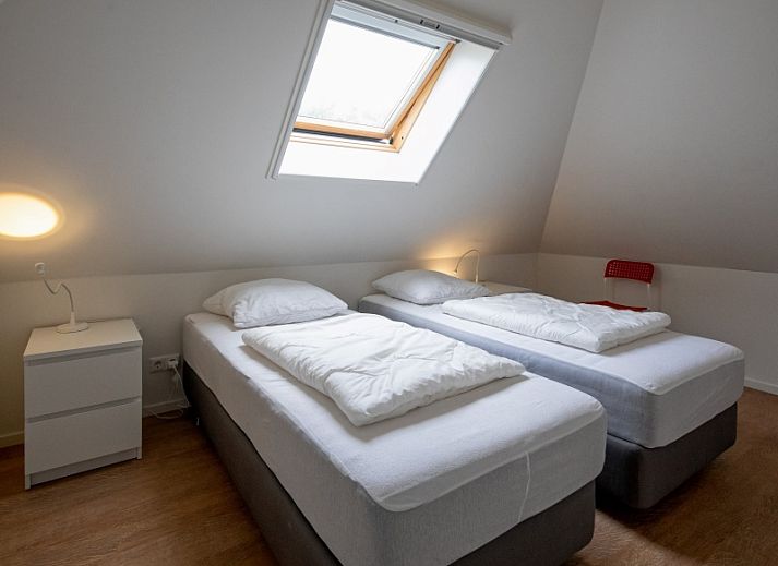 Cozy living room in Holiday home Slufteroord 240, Texel with comfortable seating area and modern furnishings.