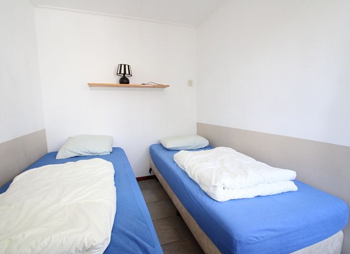 Ruime woonkamer in Bungalow Tamarisk 196, De Cocksdorp, Texel, met moderne meubels en veel natuurlijk licht.