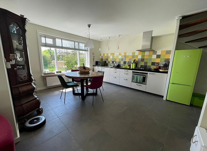 Veranda of Family House Dacha in De Cocksdorp Texel, ideal for sunny days in a vacation home on the Wadden Islands.