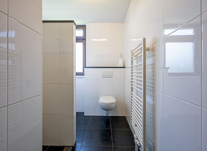 Gemuetliches Wohnzimmer des Ferienhauses Slufterhoek 078 in De Cocksdorp, Texel.