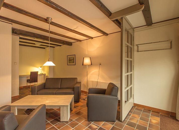 Type S-2 vakantiehuis in De Cocksdorp, Texel, met ruime tuin en traditionele architectuur.