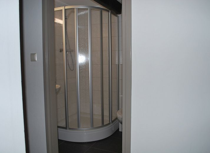 Type S-2 vakantiehuis in De Cocksdorp, Texel, met ruime tuin en traditionele architectuur.