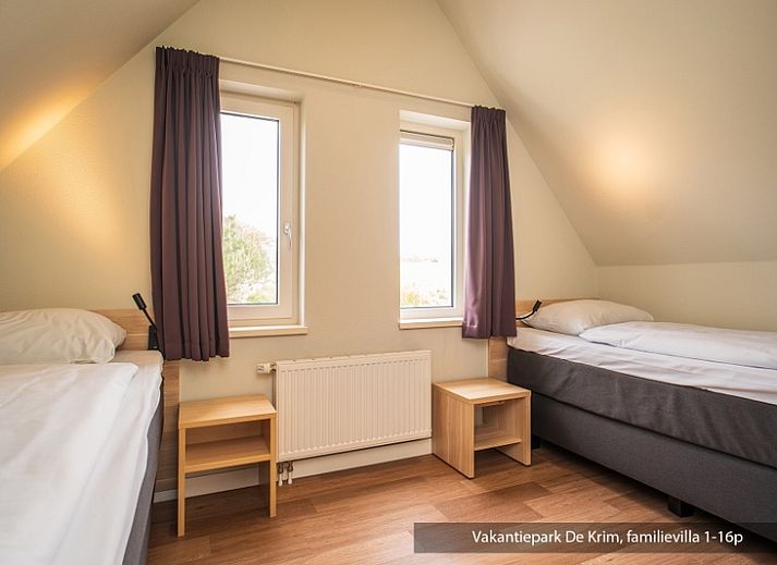 Ruime woonkamer in Familievilla 16 persoons, De Cocksdorp, Texel met moderne inrichting.