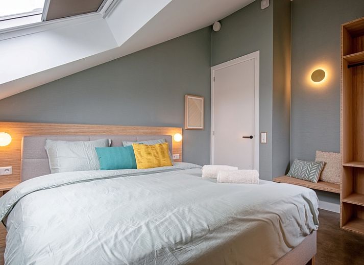 Gezellige woonkamer van Vakantiehuis Griend, De Cocksdorp, Texel met comfortabele bank.