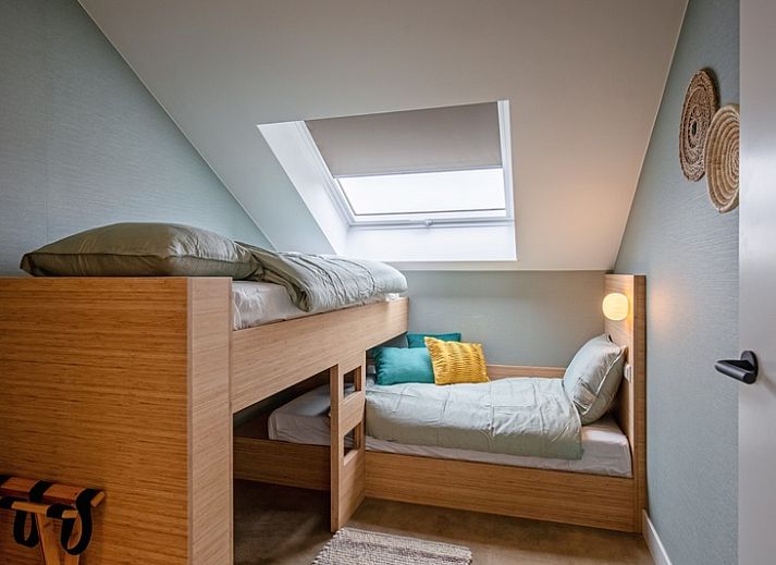 Gezellige woonkamer van Vakantiehuis Griend, De Cocksdorp, Texel met comfortabele bank.