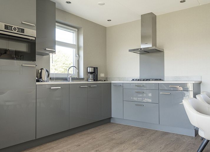 Landhuis type K in De Cocksdorp op Texel, een charmant vakantiehuis met rieten dak omgeven door natuur.