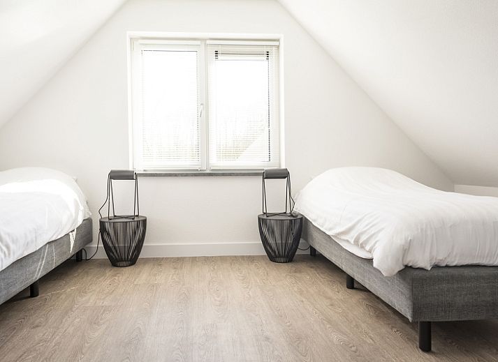 Moderne binnenruimte van Landhuis type K in De Cocksdorp, Texel, met stijlvolle keuken en eetgedeelte.