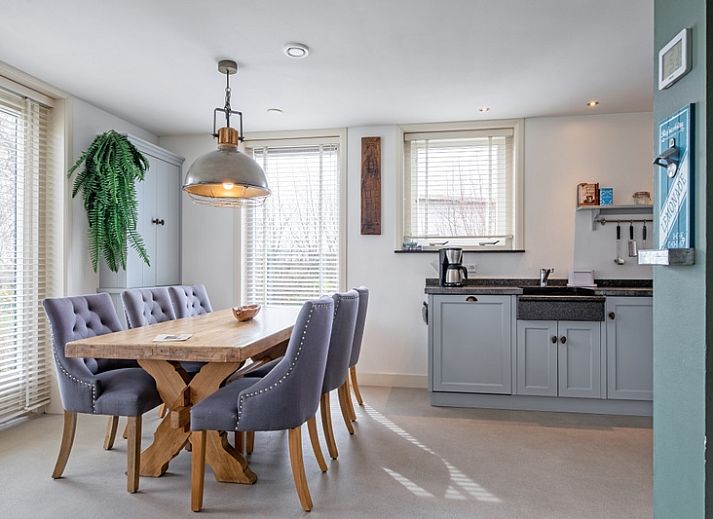 Gezellige woonkamer in Bungalow Postweg 109, De Cocksdorp, Texel. Comfortabel vakantiehuis op de Waddeneilanden.