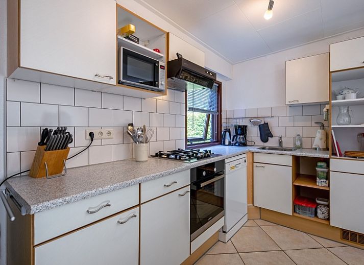 Ferienhaus Slufterduin 092 in De Cocksdorp, Texel mit grossem Garten und Terrasse, ideal fuer Entspannung auf den Watteninseln.