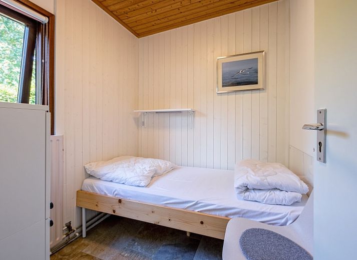 Offene Kueche und Sitzecke im Ferienhaus Slufterduin 092, De Cocksdorp, Texel, ideal fuer einen entspannten Aufenthalt auf den Watteninseln.