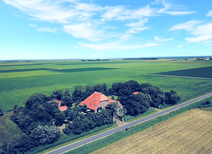 Charmant Vakantiehuis in De Cocksdorp op Texel met groene omgeving.