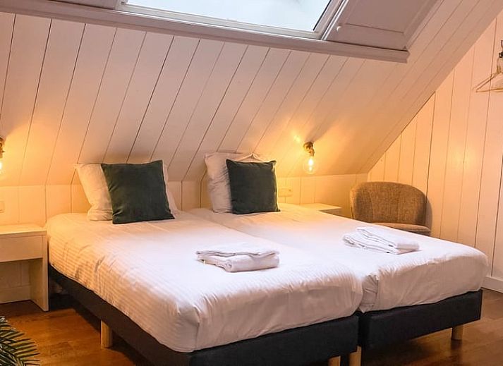 Luchtfoto van Vakantiehuis in De Cocksdorp, gelegen te midden van Texelse natuur.