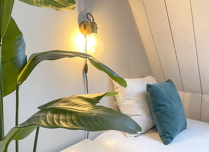 Stijlvolle eetkamer in Vakantiehuis in De Cocksdorp, Texel, perfect voor familiediners.