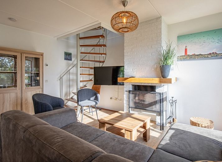 Villapark Residentie Texel nr. 711, een charmant vakantiehuis in De Cocksdorp, Texel, met zonnig terras en groene tuin op de Waddeneilanden.