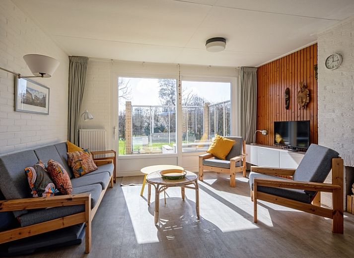 Bungalowpark Slufteroord 292 in De Cocksdorp, Texel, biedt een vakantiehuis met groene tuin en zonnig terras op de Waddeneilanden.