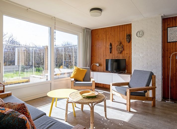Bungalowpark Slufteroord 292 in De Cocksdorp, Texel, biedt een vakantiehuis met groene tuin en zonnig terras op de Waddeneilanden.