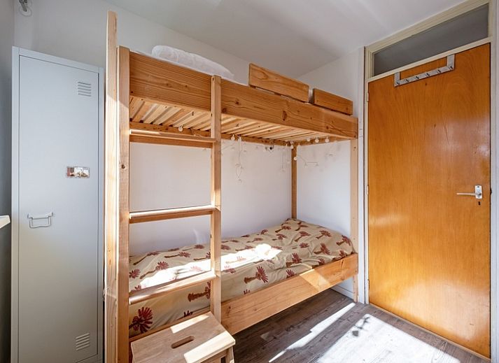 Gezellige zithoek in Vakantiehuis Slufteroord 292, Bungalowpark Slufteroord, De Cocksdorp, Texel, perfect voor ontspannen avonden.