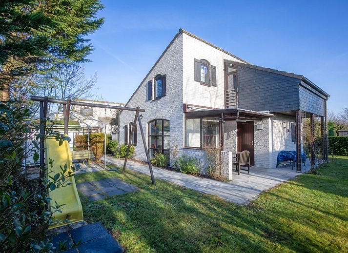 Villapark Residentie Texel nr. 463, een charmant vakantiehuis in De Cocksdorp, Texel, omgeven door groene natuur en rustgevende omgeving.