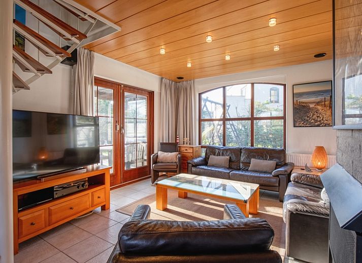 Villapark Residentie Texel nr. 463, een charmant vakantiehuis in De Cocksdorp, Texel, omgeven door groene natuur en rustgevende omgeving.