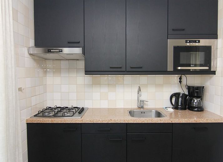 Vakantiehuis D 503 in De Cocksdorp, Texel biedt een charmante buitenruimte met terras en groene omgeving op de Waddeneilanden.