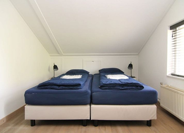 Vakantiehuis D 503 in De Cocksdorp, Texel biedt een ruime tuin met natuurlijke omgeving en ontspannende buitenruimte op de Waddeneilanden.