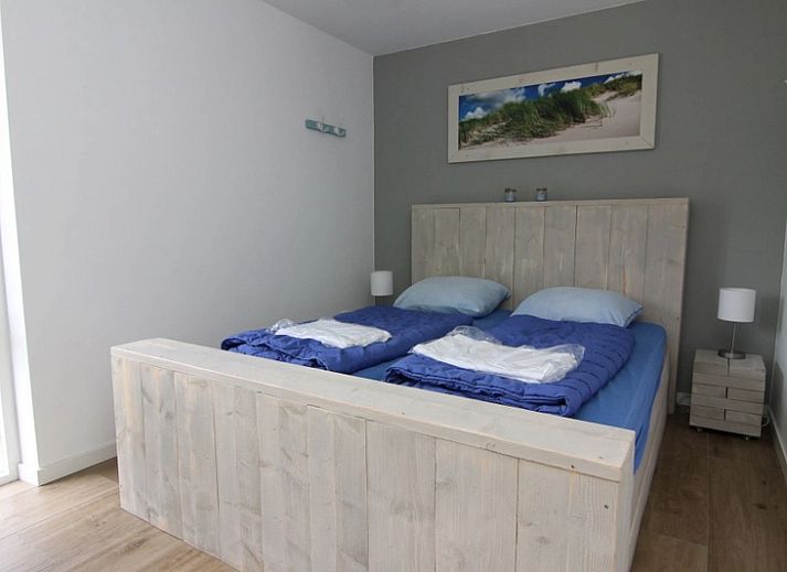 Vakantiehuis D 703 in De Cocksdorp, Texel, biedt een ruime tuin en rustieke charme op de Waddeneilanden.