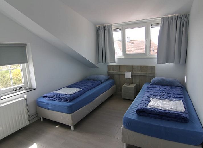 Vakantiehuis D 703 in De Cocksdorp, Texel, biedt een ruime tuin en rustieke charme op de Waddeneilanden.