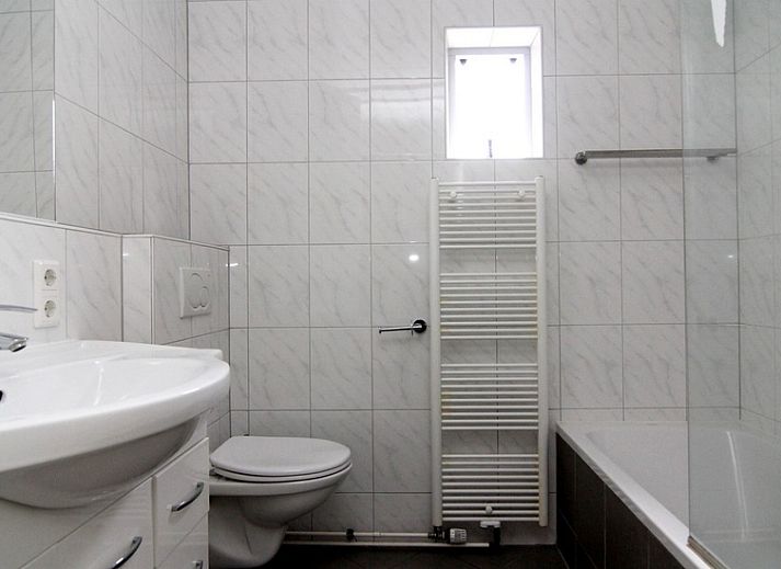 Enjoy the terrace of Holiday home D 449 in De Cocksdorp, Texel, surrounded by green nature on the Wadden Islands.