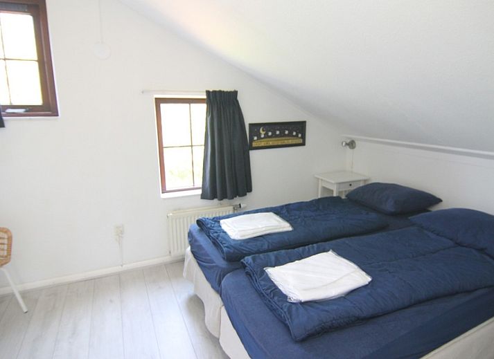 Enjoy the terrace of Holiday home D 449 in De Cocksdorp, Texel, surrounded by green nature on the Wadden Islands.