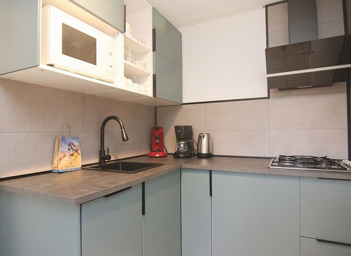 Vakantiehuis C 059 in De Cocksdorp, Texel: Geniet van de groene tuin en het ruime terras van deze Waddeneilanden vakantiewoning.