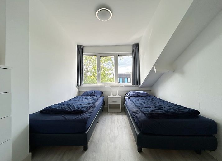 Geniessen Sie den Garten und die Terrasse des Ferienhauses B 203 in De Cocksdorp, Texel, einer charmanten Unterkunft auf den Watteninseln.