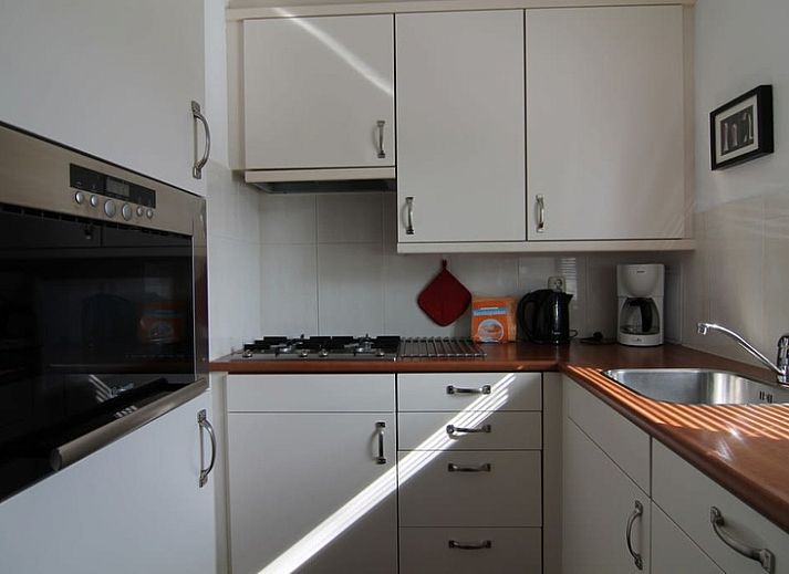 Vakantiehuis A 343 in De Cocksdorp, Texel, biedt een serene buitenaanblik met omringende natuur op de Waddeneilanden.