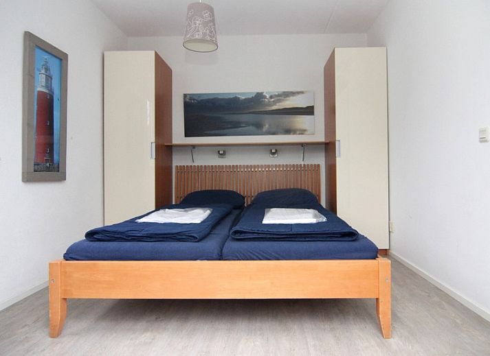 Vakantiehuis A 343 in De Cocksdorp, Texel, biedt een serene buitenaanblik met omringende natuur op de Waddeneilanden.