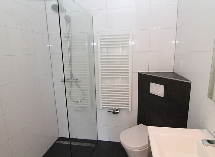 Vakantiehuis A 343 in De Cocksdorp, Texel, biedt een serene buitenaanblik met omringende natuur op de Waddeneilanden.