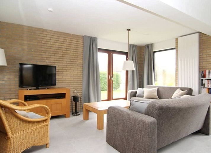 Vakantiehuis A 245 in De Cocksdorp, Texel, biedt een moderne buitenkant met een ruime tuin, ideaal voor een ontspannen verblijf op de Waddeneilanden.