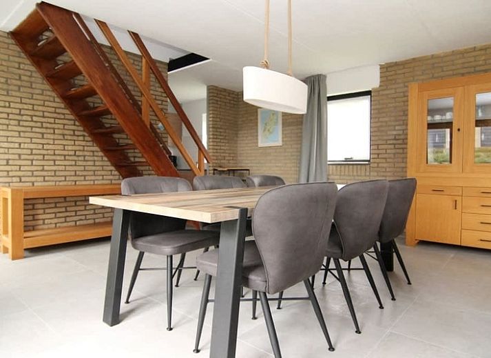 Vakantiehuis A 245 in De Cocksdorp, Texel, biedt een moderne buitenkant met ruime tuin, ideaal voor een ontspannen verblijf op de Waddeneilanden.