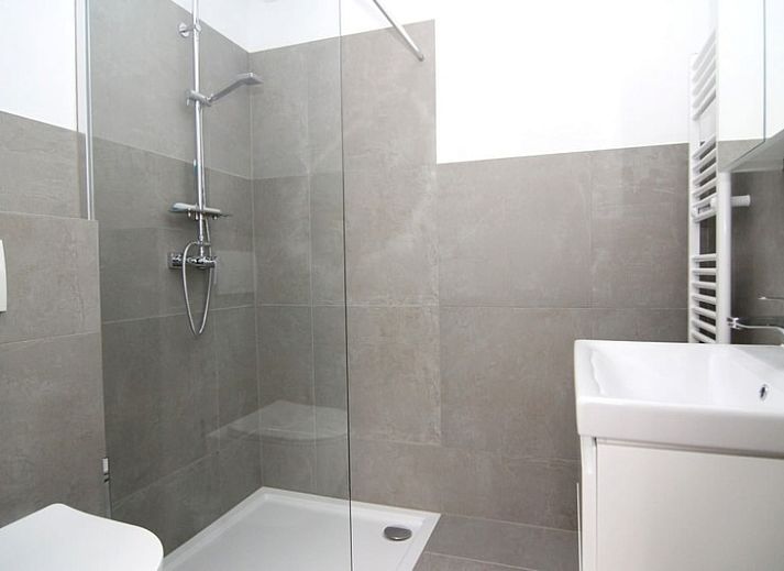 Vakantiehuis A 245 in De Cocksdorp, Texel, biedt een moderne buitenkant met ruime tuin, ideaal voor een ontspannen verblijf op de Waddeneilanden.