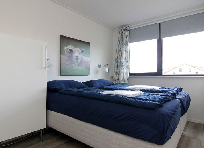 Ferienhaus A 381 in De Cocksdorp, Texel mit sonniger Terrasse und gruenem Garten, ideal fuer einen erholsamen Aufenthalt auf den Watteninseln.