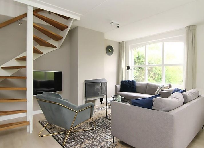 Vakantiehuis D 615 in De Cocksdorp, Texel, biedt een ruime buitenruimte met terras, ideaal voor ontspanning op de Waddeneilanden.