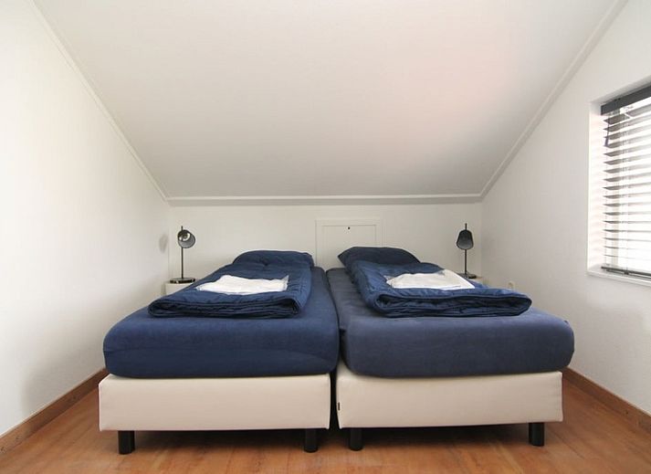 Vakantiehuis D 615 in De Cocksdorp, Texel met zonnig terras en moderne buitenruimte op de Waddeneilanden.