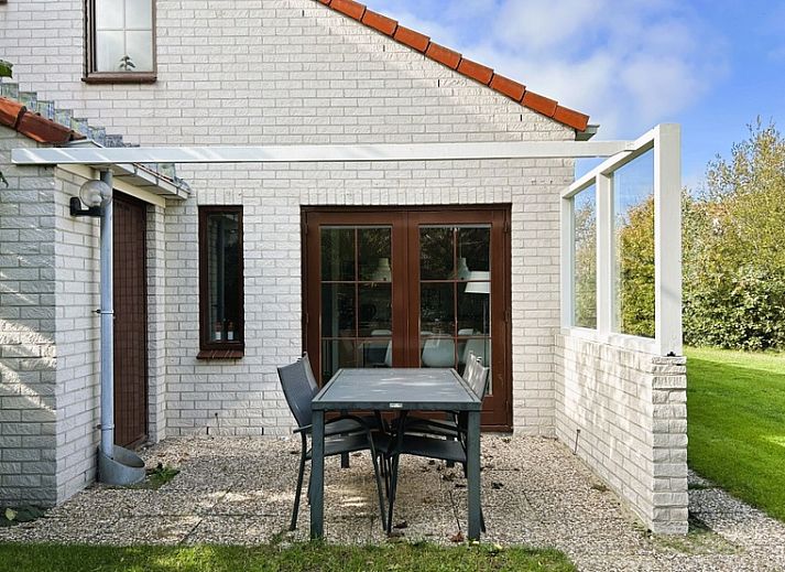 Vakantiehuis D 429 in De Cocksdorp, Texel, omgeven door groene natuur en rustieke charme op de Waddeneilanden.