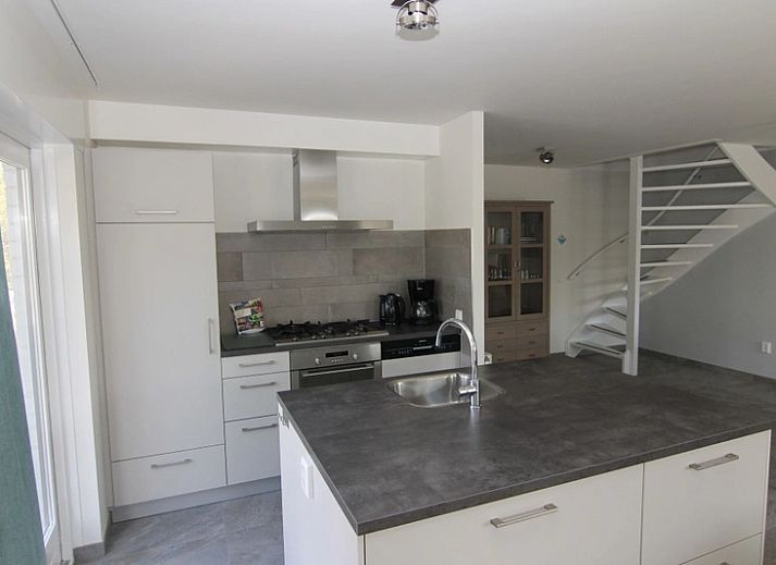 Vacation home D 669 in De Cocksdorp, Texel offers a spacious terrace and green surroundings for a relaxing stay on the Wadden Islands.