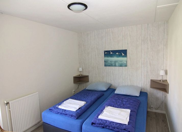 Vacation home D 669 in De Cocksdorp, Texel offers a spacious terrace and green surroundings for a relaxing stay on the Wadden Islands.