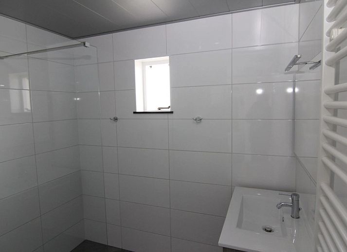 Vacation home D 669 in De Cocksdorp, Texel offers a spacious terrace and green surroundings for a relaxing stay on the Wadden Islands.