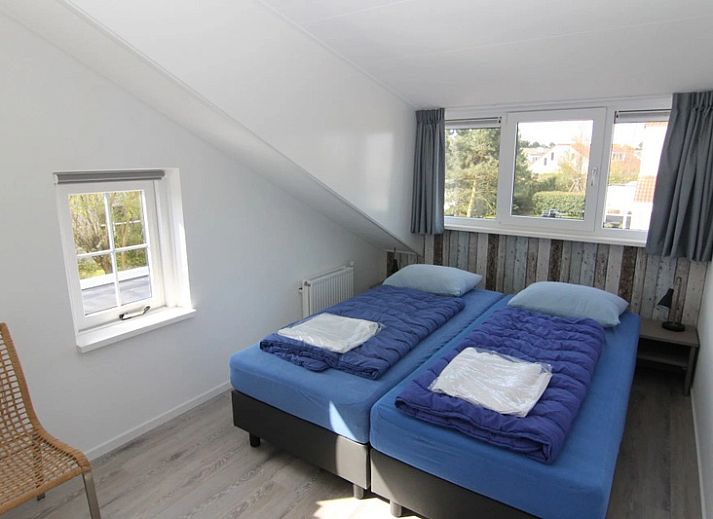 Vacation home D 669 in De Cocksdorp, Texel offers a spacious terrace and green surroundings for a relaxing stay on the Wadden Islands.